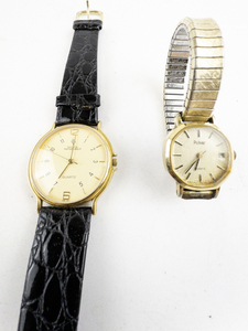 lot 133 image: Gloria Vanderbilt & Pulsar Gold Tone Base Metal Quartz Analog  Watches. Does not run