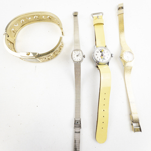 lot 137 image: Ladys Group of 4  1 bangle style, Minnie mouse, Seiko, Caravella, Base Metal Quartz Analog watch. Does not run