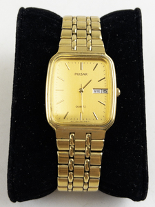 lot 170 image: Mens Pulsar tank style with daydate gold tone base metal Quartz Analog watch. New battery