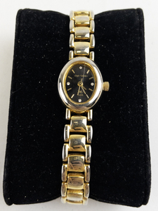 lot 173 image: Ladys Sergio Valente with crack through crystal and rhinestone dial markers gold tone base metal Quartz Analog watch. new battery