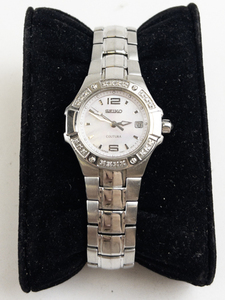 lot 178 image: Ladys Seiko pink dial cortura with date silver tonestainless steel Quartz Analog watch. new battery