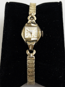 lot 180 image: Ladys Waltham art deco style ornate case gold tone gold filled Mechanical Watch. starts when wound