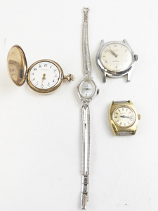 lot 220 image: Ladys Group of 4  containing timex, grand prix, helbros and K.A.Brown pocketwatch mixed base metal Mechanical Watches. starts when wound