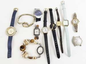lot 223 image: Ladys Group of 11 contianing mix of styles such as fossil, two unknown, swap, wrangler, burgi, jennie, venna, timex, timex, and seiko mixed base metal Quartz Analog Watches. New batteries Installed