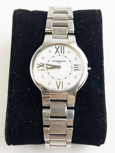 lot P1 image: Ladys Raymond Weil roman numeral with stone dial markers and patina around markers silver tone stainless steel Quartz Analog watch. Not Working