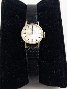 lot Q1 image: Ladys Tissot silver sunburst style dial with rust spots on the dial silver tone base metal Mechanical Watch. Starts when wound