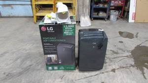lot 102 image: LG 12000 BTU Portable Air Conditioner Unit