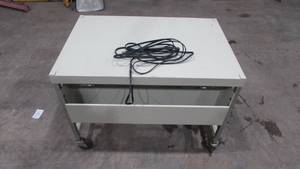 lot 110 image: Rolling Desk With Electrical Plug In