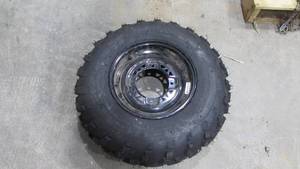 lot 141 image: ATV Tire and Rim