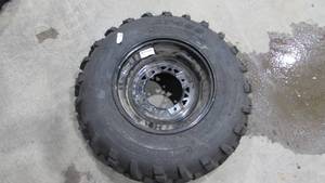 lot 142 image: ATV Tire and Rim