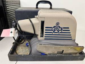 lot 8D image: Brumberger Film Projector