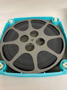 lot 95A image: Vintage Texas A&M Parks & Rec 35mm Film Reel Canister with Original Reel