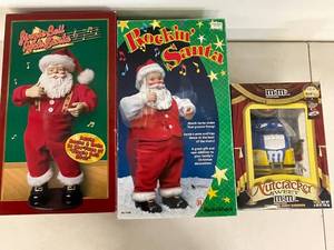 lot 99A image: Holiday Set Jingle Bell Rock Santa, Rockin Santa, and M&M Nutcracker