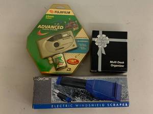 lot 45A image: Fujifilm Camera, Scraper, Organizer Set