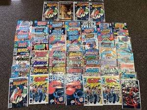lot 11R image: Vintage Justice League Avengers Spider-Woman #1 Comic Collection