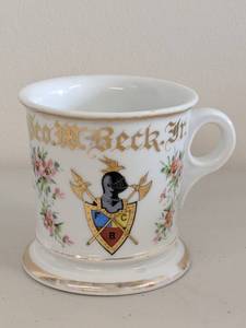 lot 57H image: Vintage Fraternal Knights of Pythias Shaving Mug with Floral Design and Coat of Arms