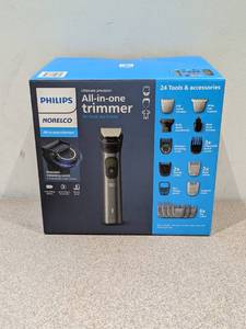 lot 64 image: PHILIPS NORELCO ULTIMATE PRECISION ALL-IN-ONE TRIMMER
