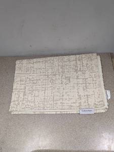 lot 123 image: CALVIN KLEIN ACCENT RUG