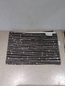 lot 124 image: CALVIN KLEIN ACCENT RUG