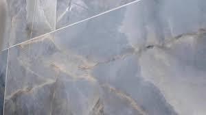 lot 15 image: Aura Blue 24 in. x 48 in. Polished Porcelain Floor and Wall Tile (28 sq. ft.)