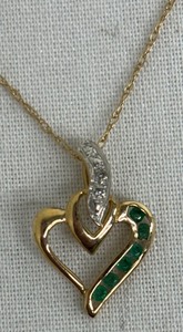 lot 98 image: 10K Gold Necklace with Emerald Stones and Petite Pin