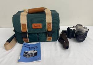 lot 79 image: Canon EOS Elan II SLR Camera with Carrying Bag and Manual