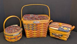 lot 147 image: Three Longaberger Flag Baskets including Longaberger 25th Anniversary Basket with Liner 1973-1989