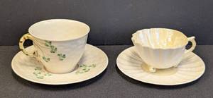 lot 176 image: Belleek Shamrock and Seashell Teacups