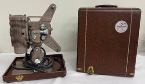 lot 71A image: Vintage Keystone K-68 8mm Movie Projector with Original Case