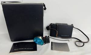 lot 111A image: Polaroid Automatic 100 Land Camera with Flash and Accessories