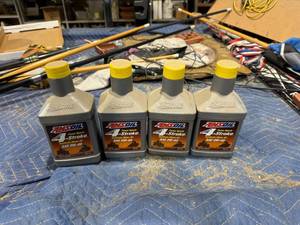 lot 44 image: 4 Quarts Amsoil 0W-40 Synthetic Oil