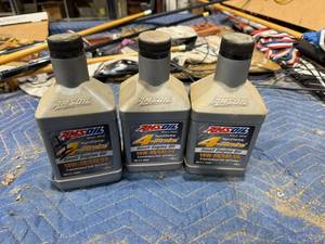 lot 45 image: 2 12 Quarts Amsoil 10W30 Synthetic 4 Stroke Oil