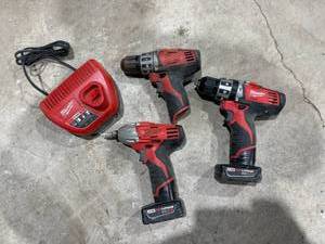 lot 50 image: Milwaukee M12 Cordless Drills With Charger & 2 Batteries