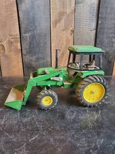 lot 19 image: John Deere Toy Loader Tractor in Good used Condition