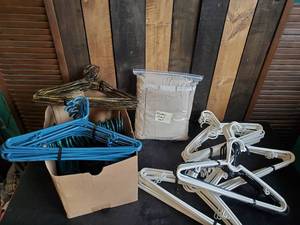 lot 82 image: Lots and Lots of Hangers and Nice set of Queen Sheets