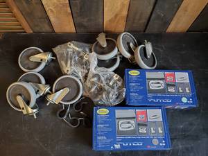 lot 86 image: Caster Wheels and Putco Chrome Door Handle Covers