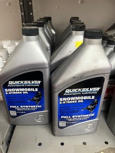 lot 11 image: &nbspbottles of Quicksilver full synthetic snowmobile 2 stroke oil