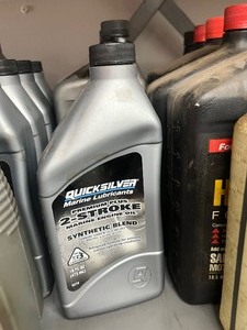 lot 7 image: bottle of Quick silver 2 stroke 2 cycle outboard oil