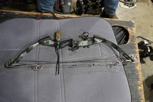 lot 14 image: PSE Fire Flite Express Compound Bow With Arrows & Camo Case
