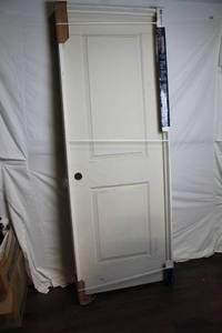 lot 105 image: Unfinished Panel Door Pre-Hung with Pre-Drilled Borehole