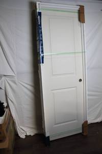 lot 106 image: 28 x 80 Inch Left Hand Molded 2-Panel Smooth Door with Flat Jamb
