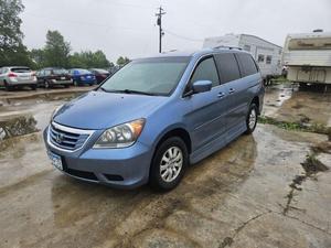 2008 Honda Odyssey with Wheelchair ramp that comes out with a push of a button