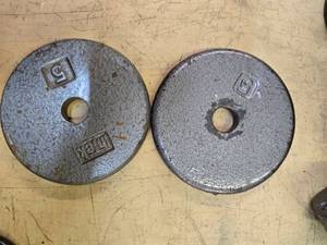 lot 64 image: A pair of 5LB Weight Plates (USED)