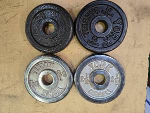 lot 69 image: Lot of four 2.5LB Weight Plates (USED)