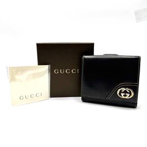 lot 62 image: Gucci Black Patent Leather Bifold Wallet with Gold GG Emblem Pre-Owned Retail $595