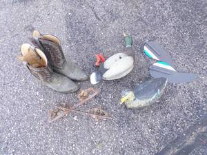 lot 29 image: Size 10 Cowboy Boots, Vintage Ice Skates, Motorized Duck Decoy and Duck Decoy with Weight