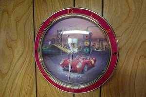 lot 322Q image: Panclox Automotive Wall Clock with Hourly Sound Effects