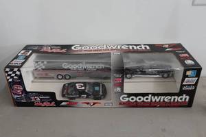 lot 232 image: Dale Earnhardt Goodwrench Racing Team Truck and Trailer 124 Scale Replica Set