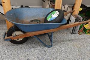 lot 310 image: Wheelbarrow with Spare Tire and Bungee Cords