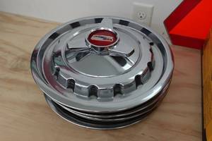 lot 317 image: 1957 Chevrolet Hub Caps